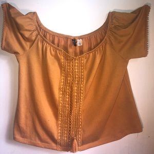 I am selling a cute mustard yellow/dark yellow top